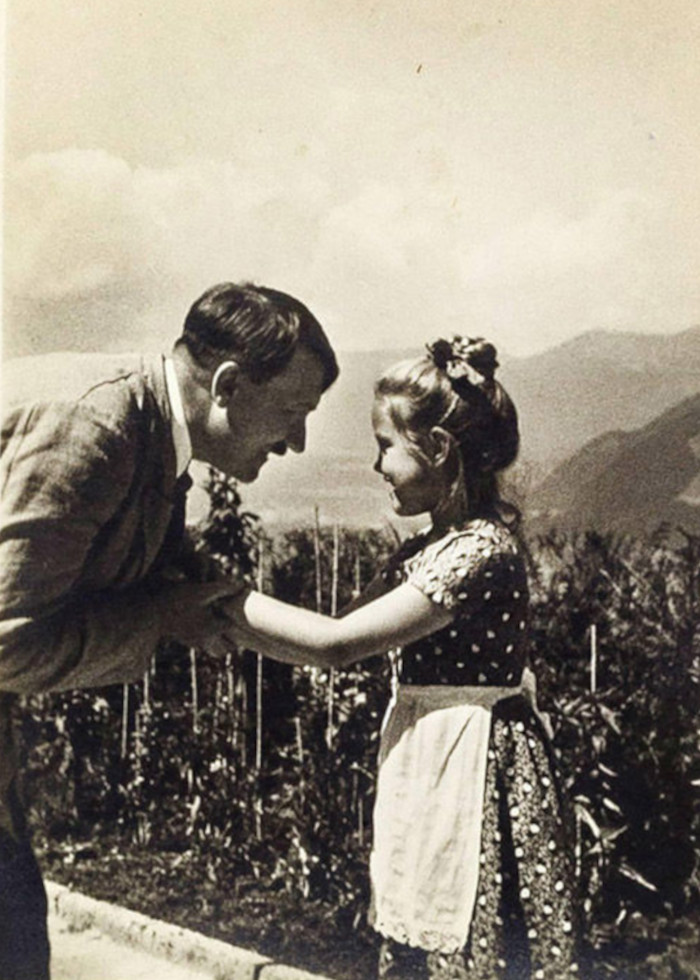 hitler embraces a child