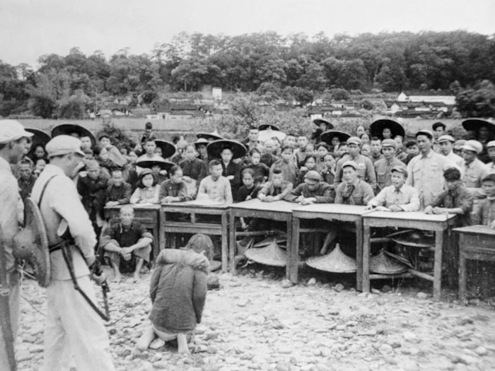 A landlord is put through a struggle session during the Great Leap Forward, a practice popular during the later Cultural Revolution, Guangdong, circa 1953